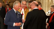 High notes: Prince Charles arrives at the service, on Wednesday